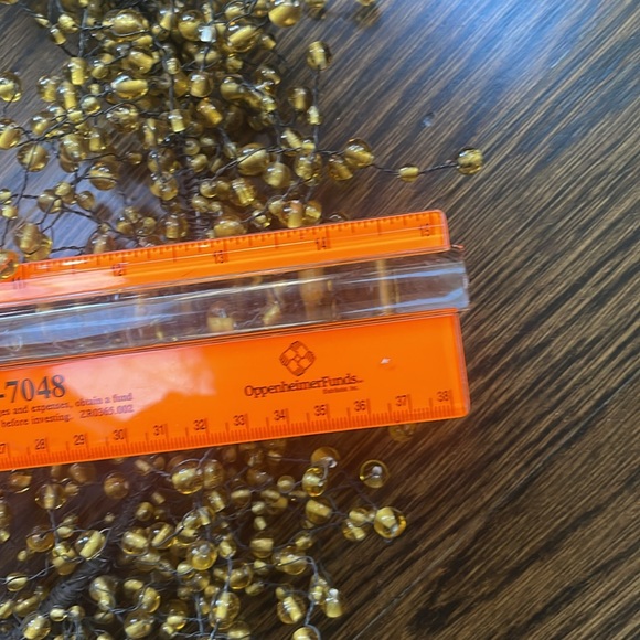 Gold bead wreath on metal frame. Diameter frame 10.5 inches. Beads stretch to 15 - Picture 10 of 12